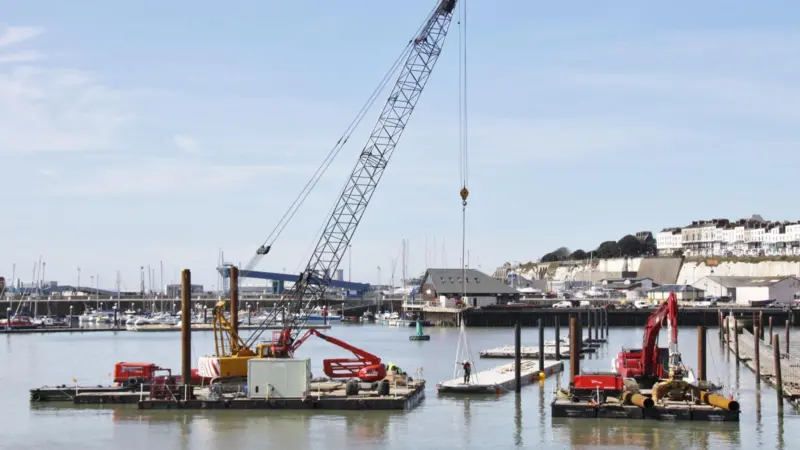 VolkerBrooks Linkflote pontoons were used during the installation of the Marinetek breakwater pontoons in the east outer marina. Photo: Peter Barker