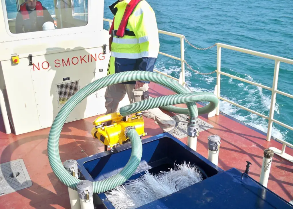 The DESMI Ro-Clean vessel for Angola has an in-built rope mop oil recovery system mounted between the two hulls.