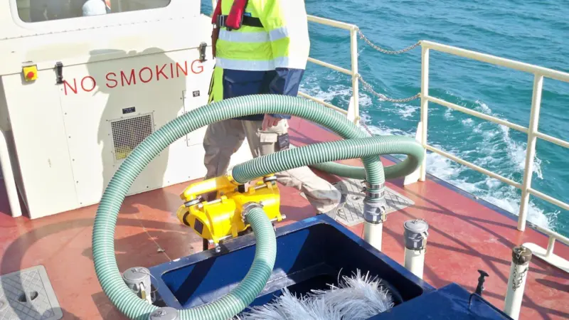 The DESMI Ro-Clean vessel for Angola has an in-built rope mop oil recovery system mounted between the two hulls.