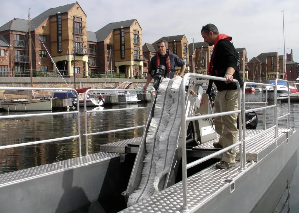 The Pollution Pod is a simple way of inserting an oil skimmer between the hulls of the 8m Buddy workboat.