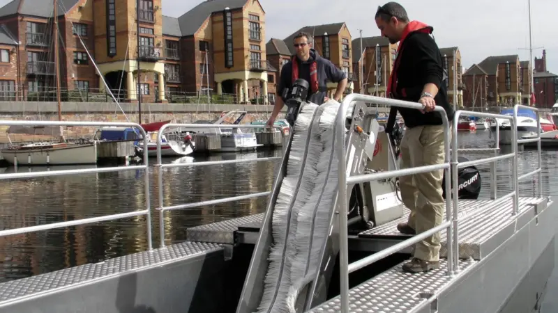 The Pollution Pod is a simple way of inserting an oil skimmer between the hulls of the 8m Buddy workboat.