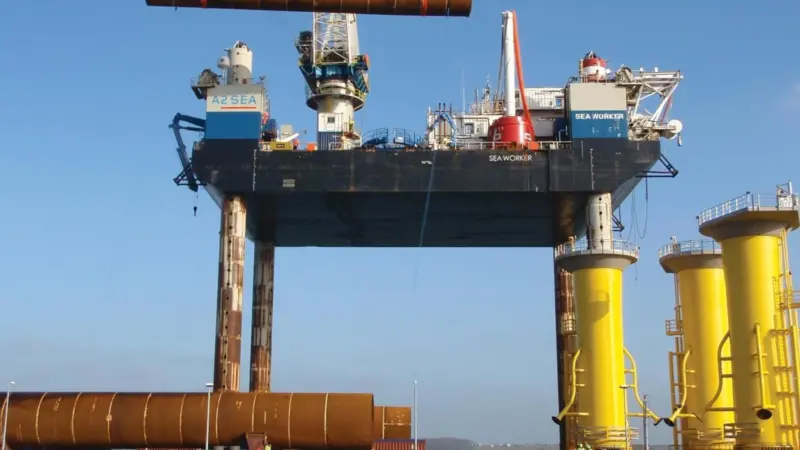 Monoplies and transition pieces are lowered onto Sea Worker at Harwich.