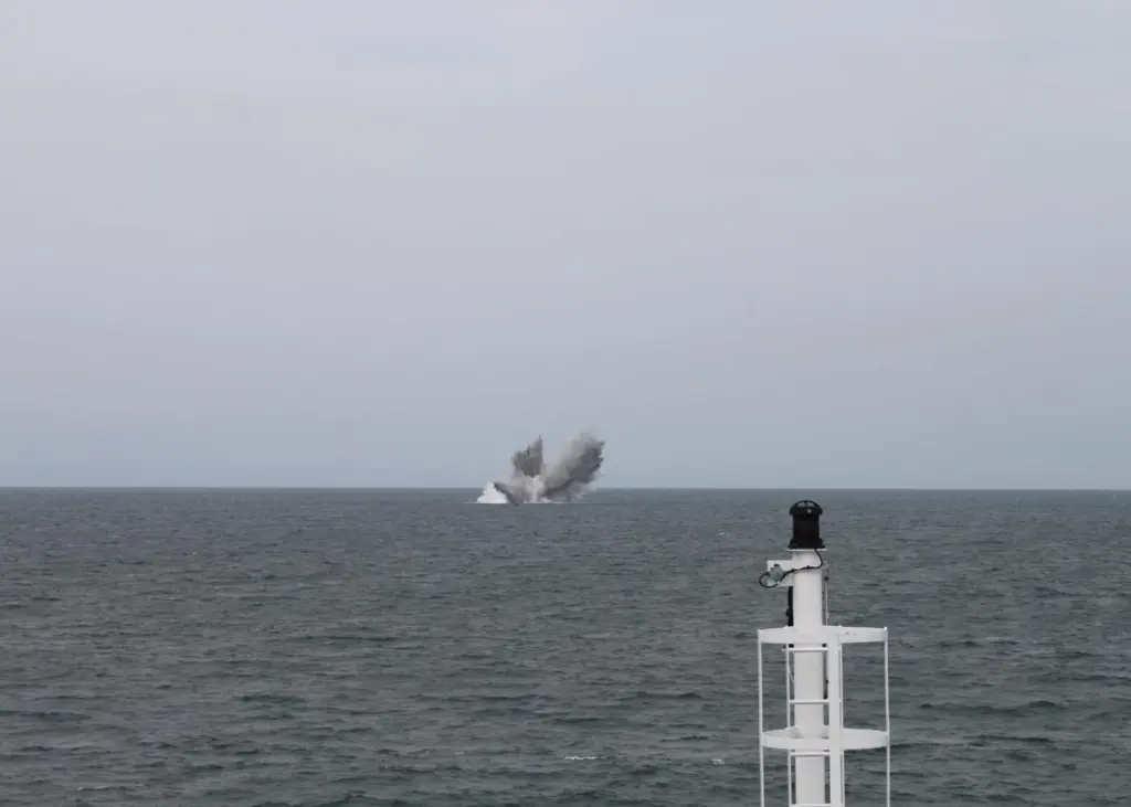 A controlled explosion initiated from a safe distance left an underwater crater 20m wide by 4m deep.