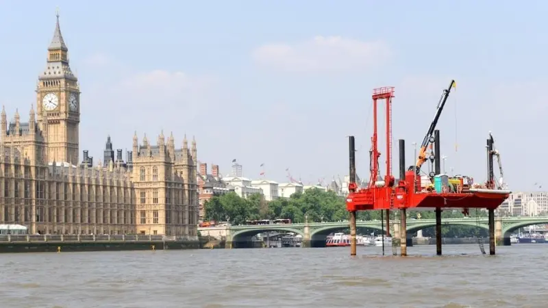 Borehole drilling works underway on the River Thames outside the Houses of Parliament.