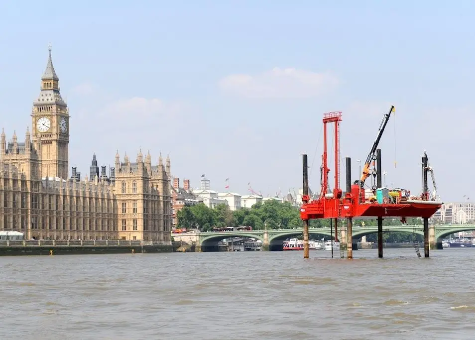 Borehole drilling works underway on the River Thames outside the Houses of Parliament.