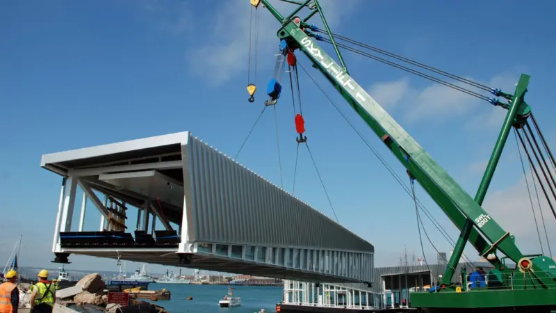 The 41m linkspan is seen halfway through its installation process on the Gosport side of Portsmouth Harbour.