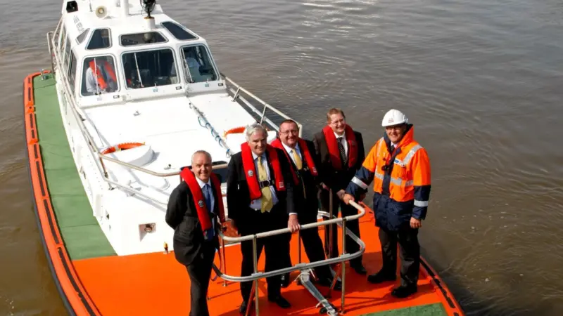 From left to right: John Fitzgerald, ABP port director Grimsby & Immingham; Lord Henley; Ian Schofield, ABP engineering director; Tom Jeynes, ABP sustainable development manager Humber; and Andrew Firman, ABP pilotage operations manager, aboard ...