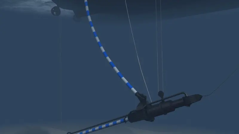The submersed excavation unit is equipped with a dredge pump and jetwater pump which are both electrically driven. The mixture piping is shown in blue and white. The unit is suspended by steel cables.