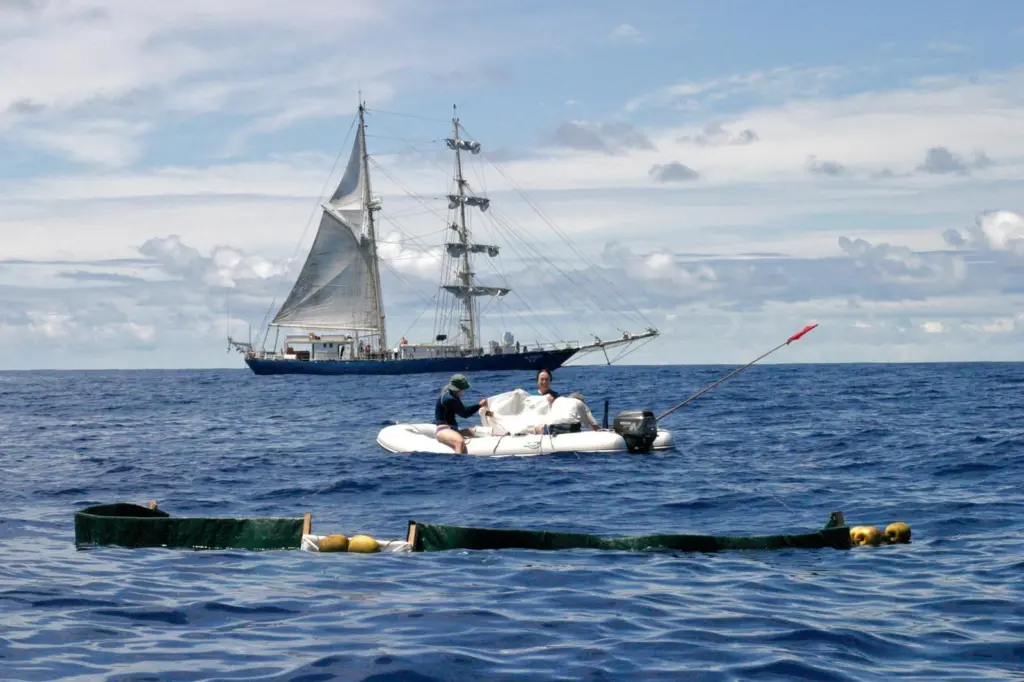 Project Kaisei team members collect mid-ocean marine debris.