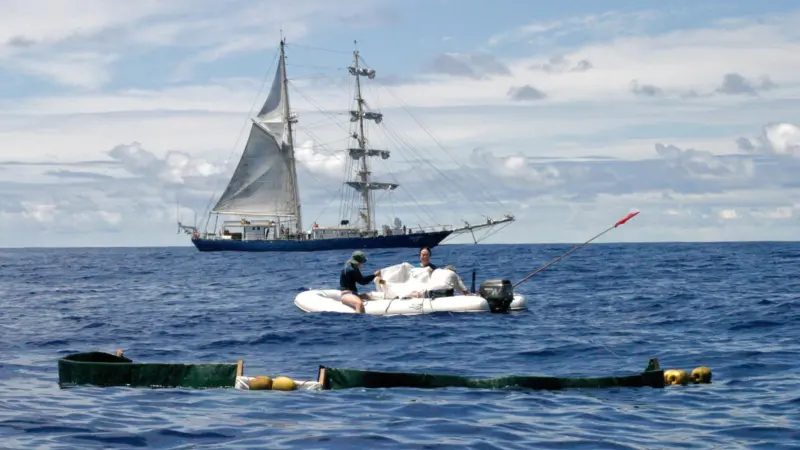 Project Kaisei team members collect mid-ocean marine debris.