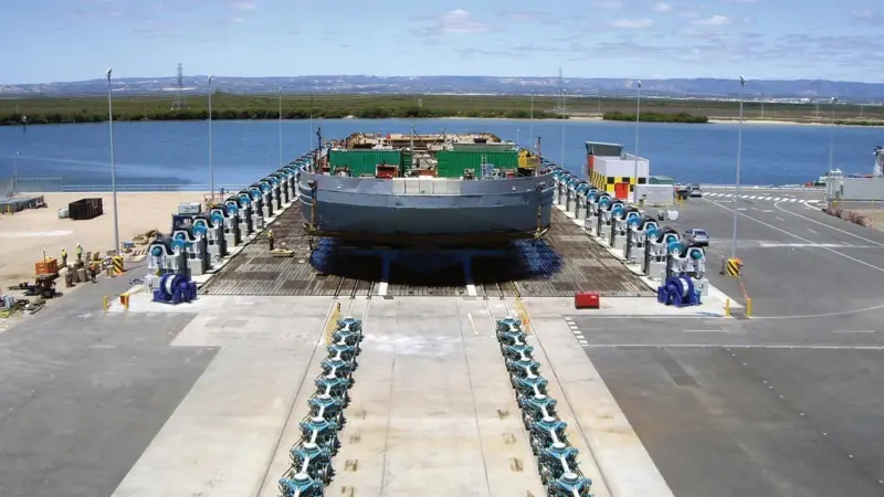 A Rolls Royce Syncrolift, showing its platform and the wheel system that helps the vessel into its dry berth.