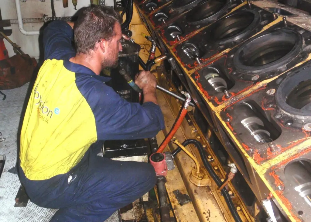 A Royston engineer works on an engine of the Southern Supporter.