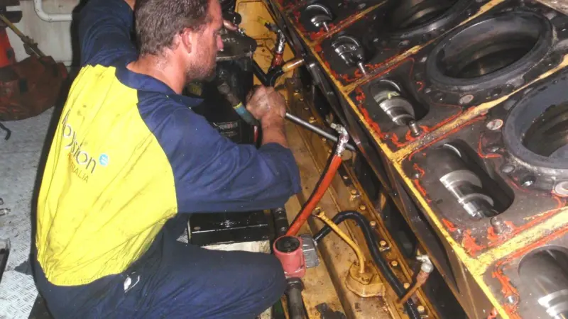 A Royston engineer works on an engine of the Southern Supporter.