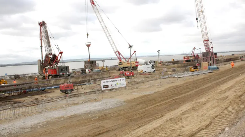 Construction of the quaywall is progressing rapidly along the seaward edge of the site.