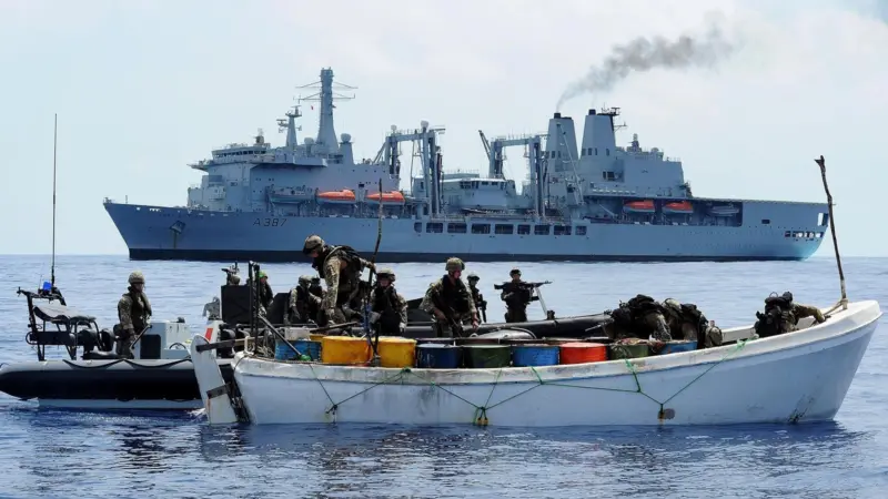 Fleeing pirates stopped and were apprehended after a Lynx helicopter fired warning shots.