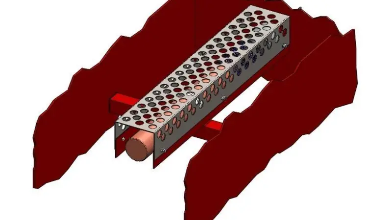 An anode with a perforated cathode plate.