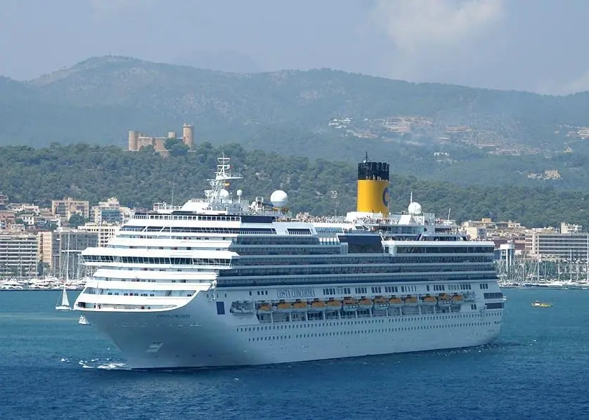 Costa Concordia, seen here in happier times, now lies semi-submerged in a protected marine nature reserve.