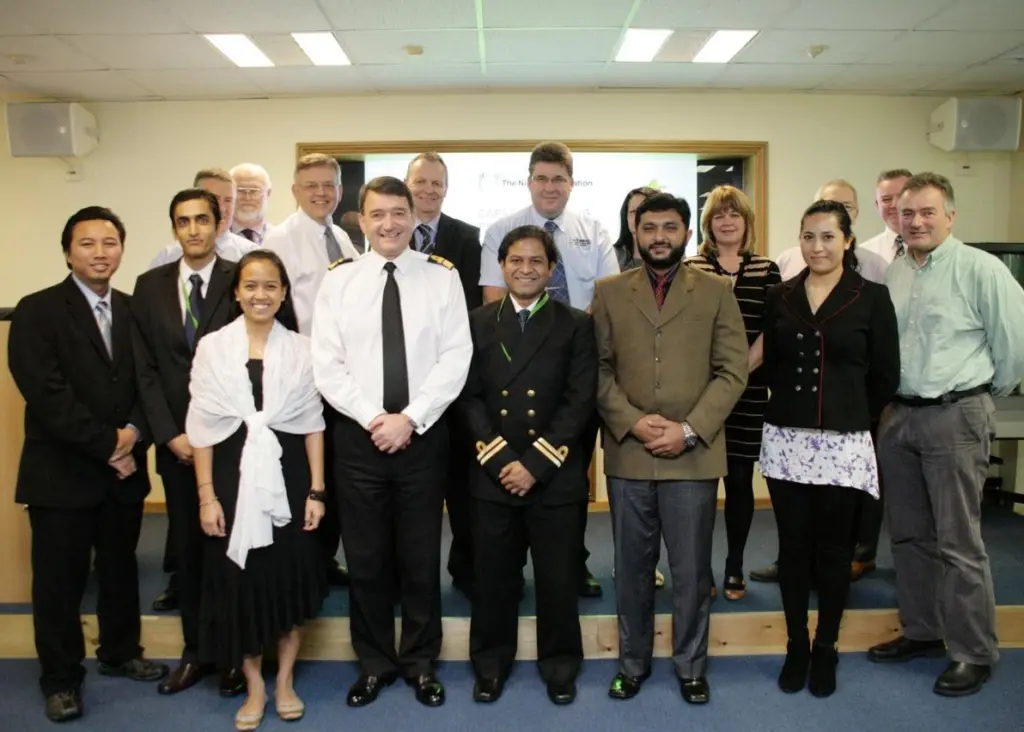 UK national hydrographer Rear Admiral Nick Lambert and his training team with six overseas hydrographic officers following completion of their UKHO marine cartography course funded by the Nippon Foundation.