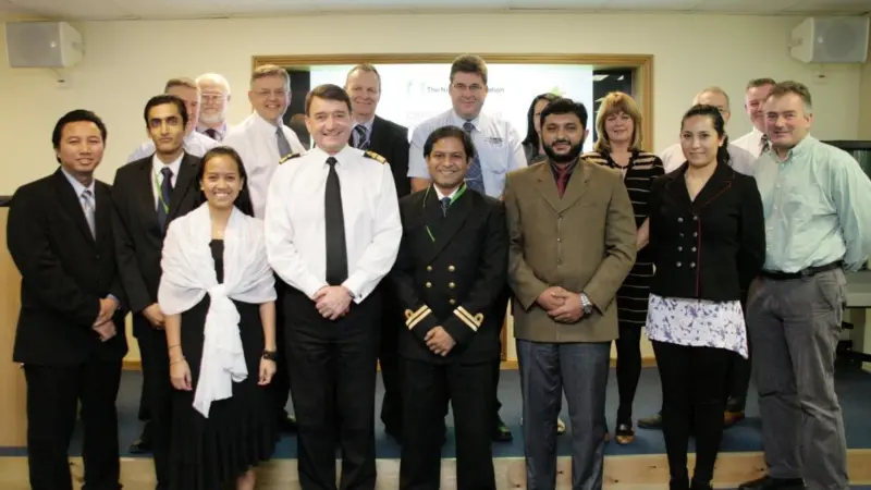 UK national hydrographer Rear Admiral Nick Lambert and his training team with six overseas hydrographic officers following completion of their UKHO marine cartography course funded by the Nippon Foundation.