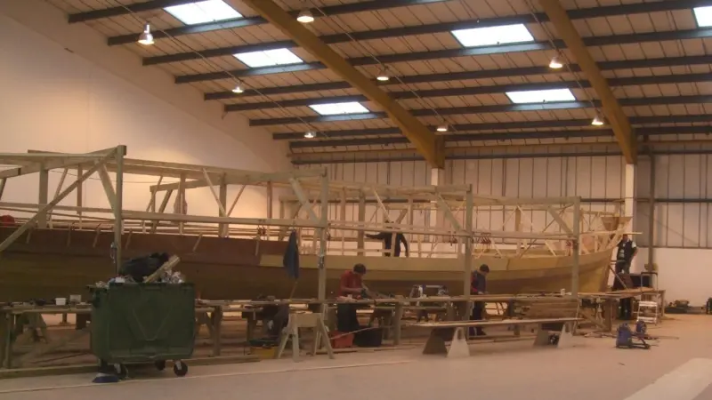 The vessel is being built at a fast pace, with two shifts of 14 craftsmen each working a six day week.