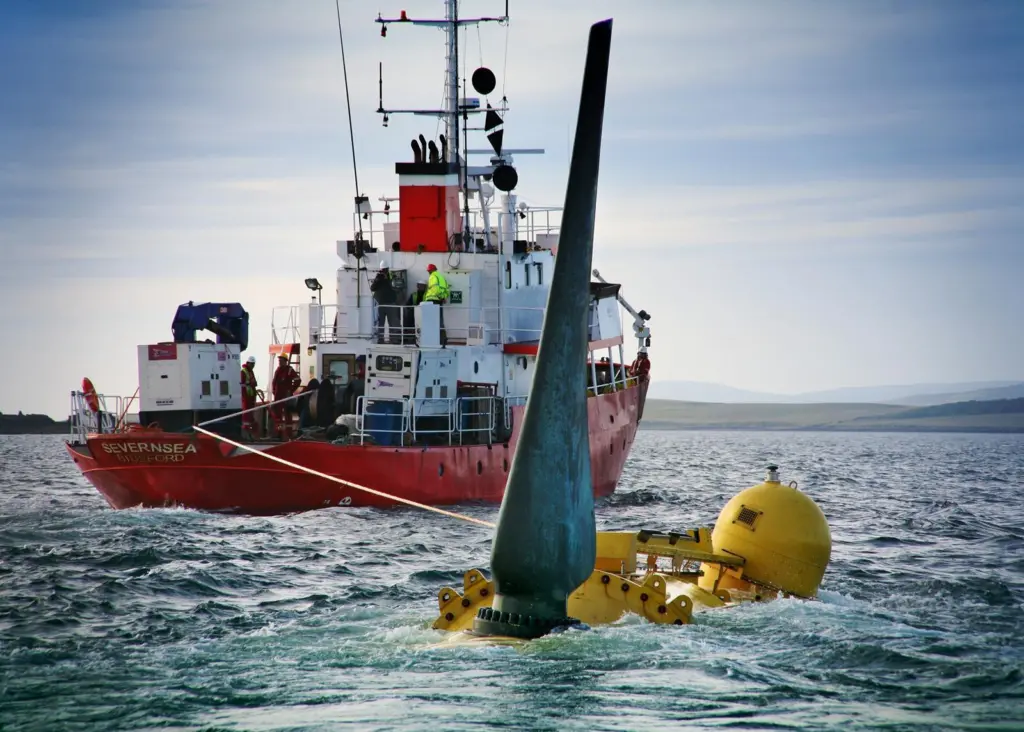 The turbine unit is semi-buoyant and can be easily towed to and from the point of operation.