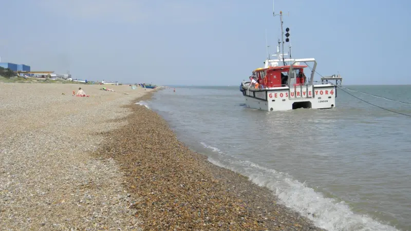 The vessel Geosurveyor 4 is seen off Sizewell Beach in Suffolk UK supporting the survey of an export cable from the Greater Gabbard Offshore Wind Farm.