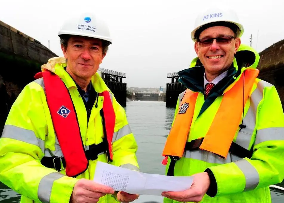 Derek Fenn, chief engineer at Atkins (right) with Andrew Brown, engineering director for Milford Haven Port Authority at Milford Dock Lock. Photo: Pembrokeshire Photography