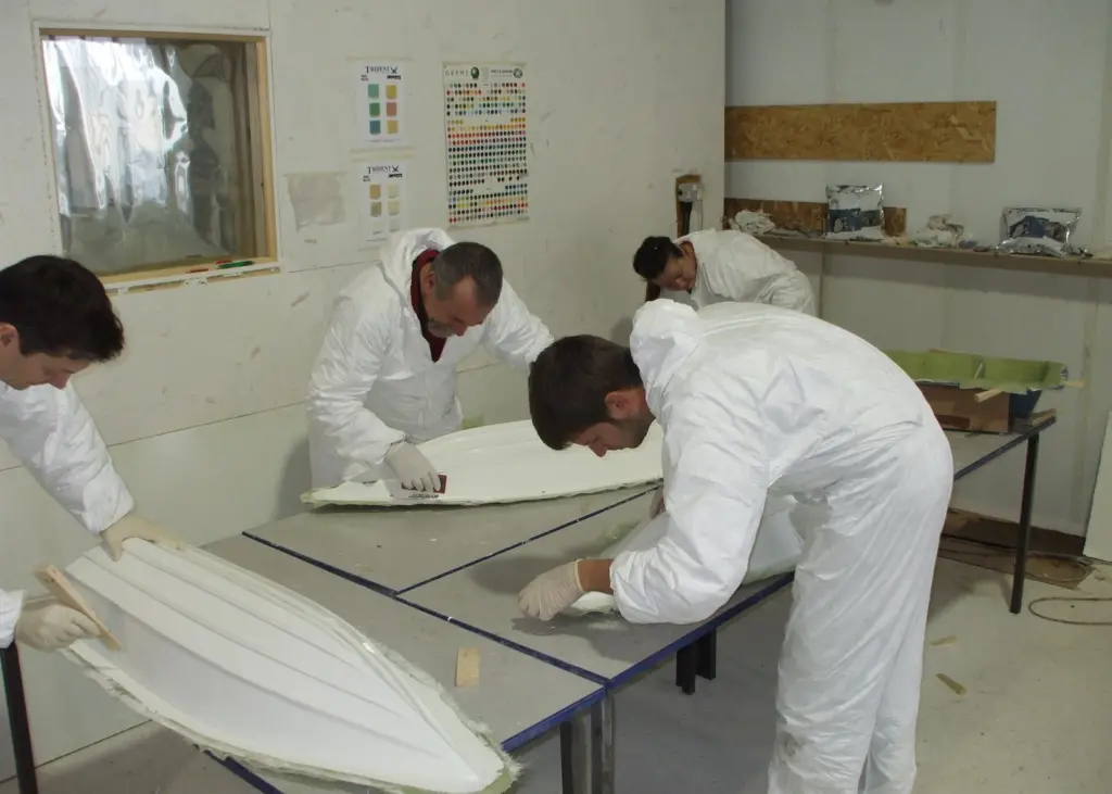 Candidates on the course check their hulls for voids.