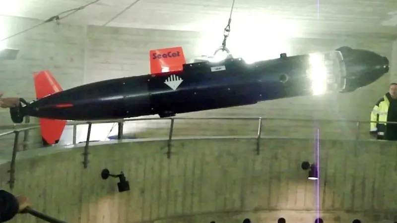 The AUV is retrieved after its seven hour mission in the tunnel.