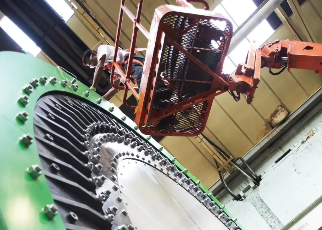 A technician at work on an NGenTec 1MW prototype