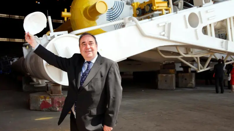 Alex Salmond MSP, the First Minister of Scotland, is seen with Edinburgh based Aquamarine Power’s Oyster 800 hydro-electric wave energy converter.