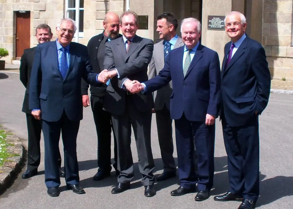 Front row: Msr Le Grand, Stuart Trought, Charles Hendry, Malcolm Wicks. Back row: Alderney States Members