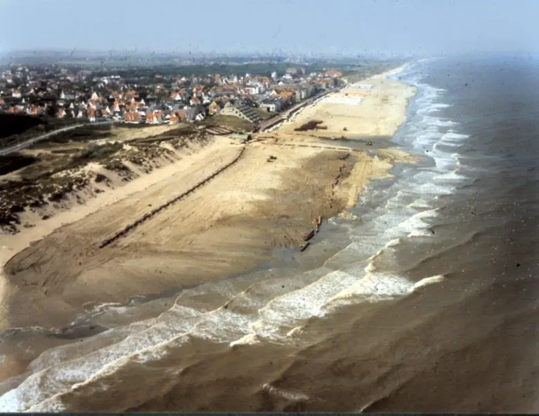 An innovative approach to coastal restoration combining profile nourishments with submerged feeder berm nourishments on the Belgian coast