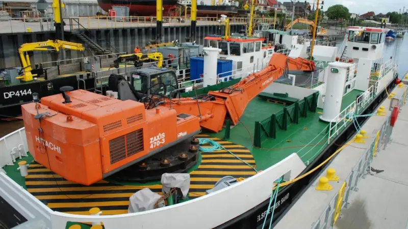 The Danish-built Elflether Sand being equipped at workshops in Brake before entering service