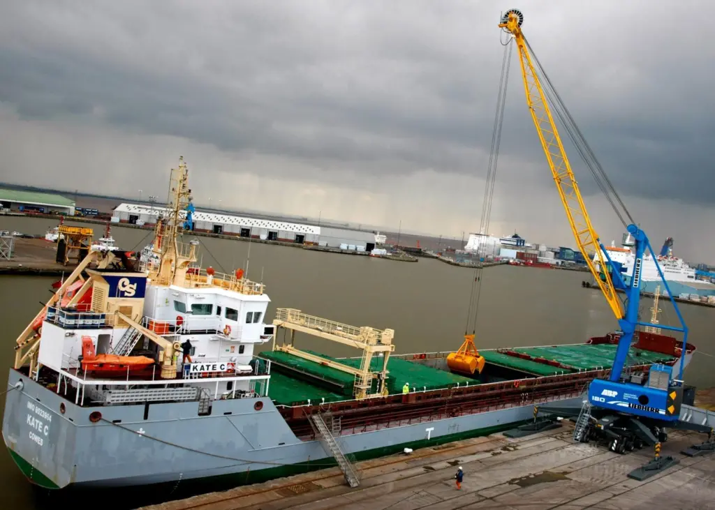 Hull’s new mobile harbour crane is seen loading the Kate C