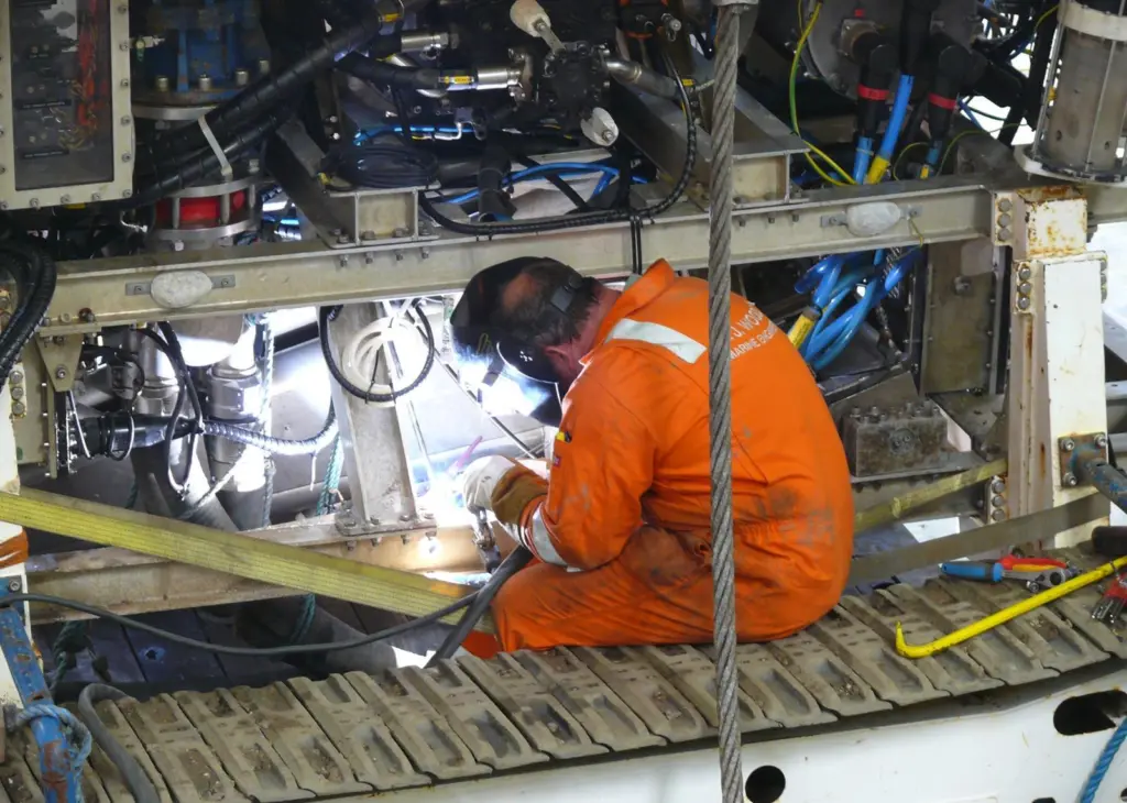 AJ Woods’ personnel carrying out emergency repairs to an ROV that had been damaged on the seabed at the Greater Gabbard Wind Farm project
