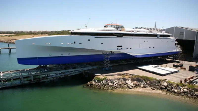 A next generation 102m Austal trimaran prepares for launch