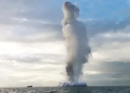 The controlled explosion caused a 76m high plume which was visible from shore