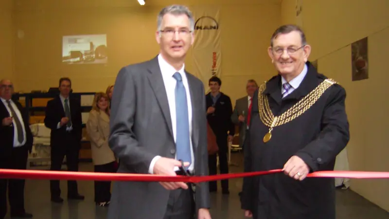 Andrew Mellard, general manager, MAN UK cut the ribbon in the presence of the Lord Mayor, Cllr Michael Wright