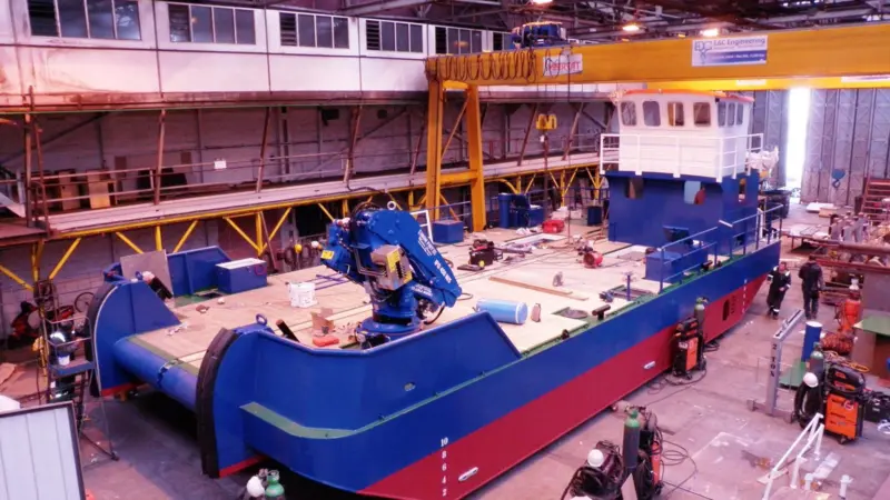 The wheelhouse was lifted up a deck and a mess room/accommodation block constructed beneath it on the main deck