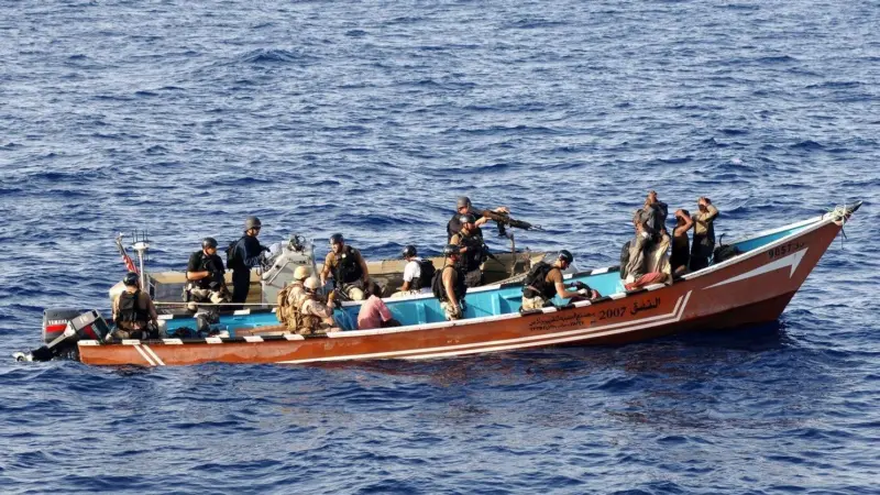 Somali pirates apprehended. Their global cost is estimated at up to $6.9bn per year