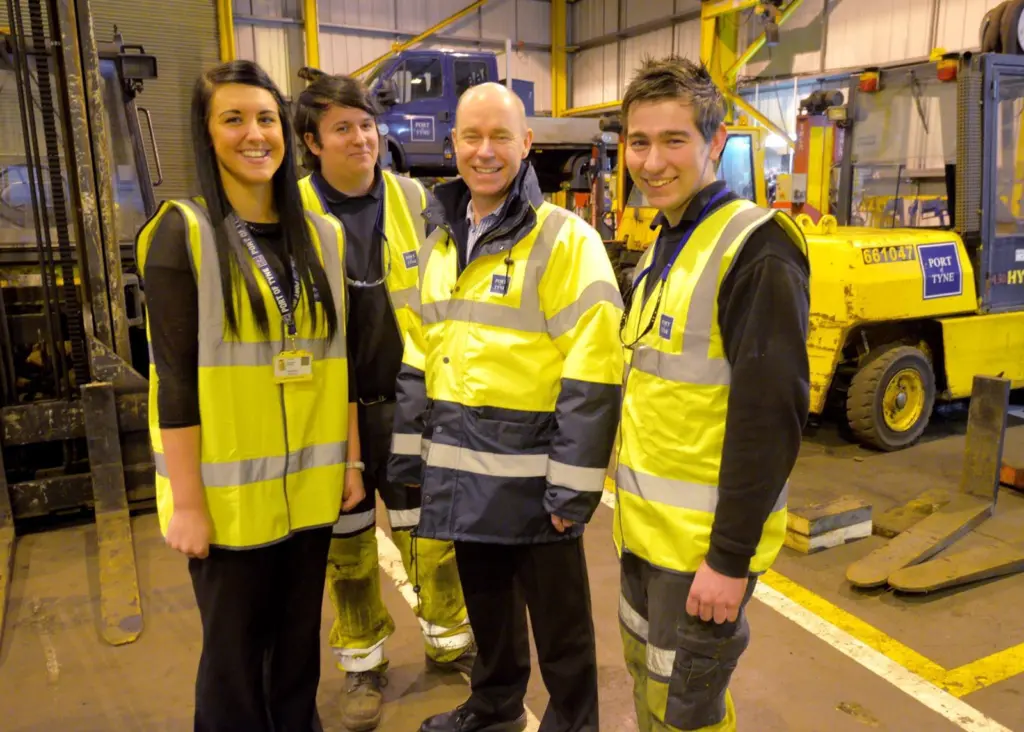 Andrew Moffat, CEO, Port of Tyne, with apprentices Leigh Alder, Tom Hall and Jordan Gibson