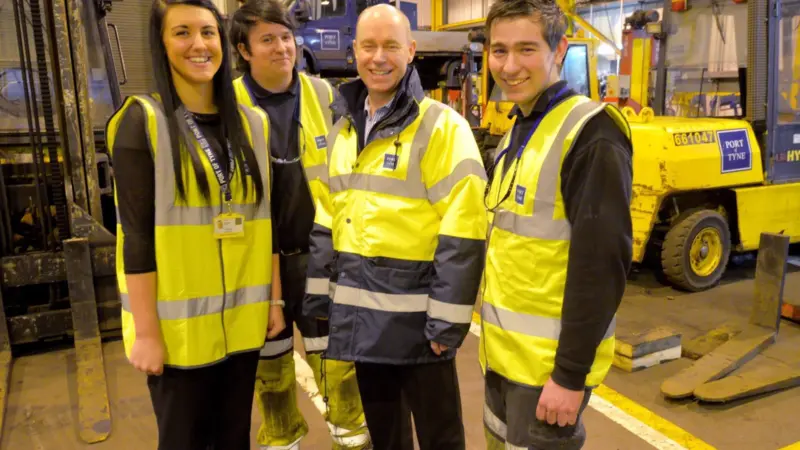 Andrew Moffat, CEO, Port of Tyne, with apprentices Leigh Alder, Tom Hall and Jordan Gibson