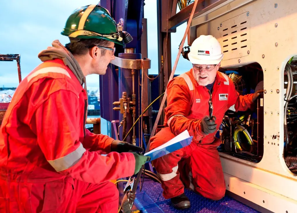 BRIL engineers inspecting a Remotely Operated Vehicle on board one of Bibby Offshore’s vessels