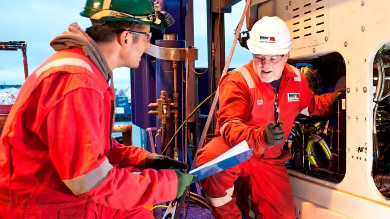 BRIL engineers inspecting a Remotely Operated Vehicle on board one of Bibby Offshore’s vessels