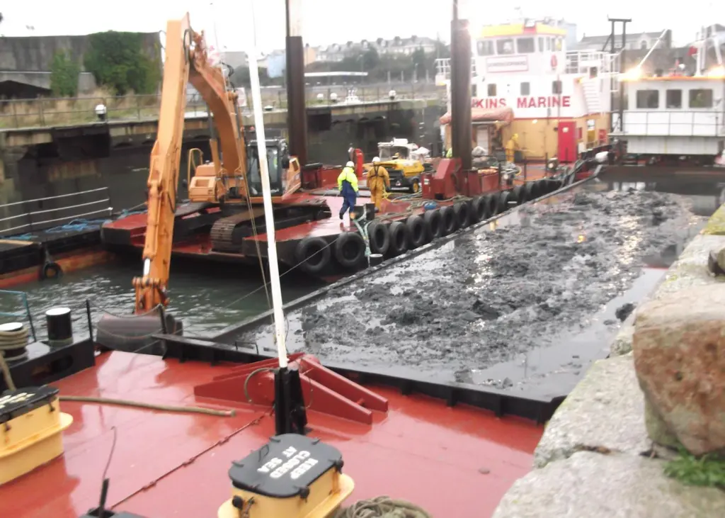 Spud barge Doreen Dorward removing contaminated waste at Millbay Dock