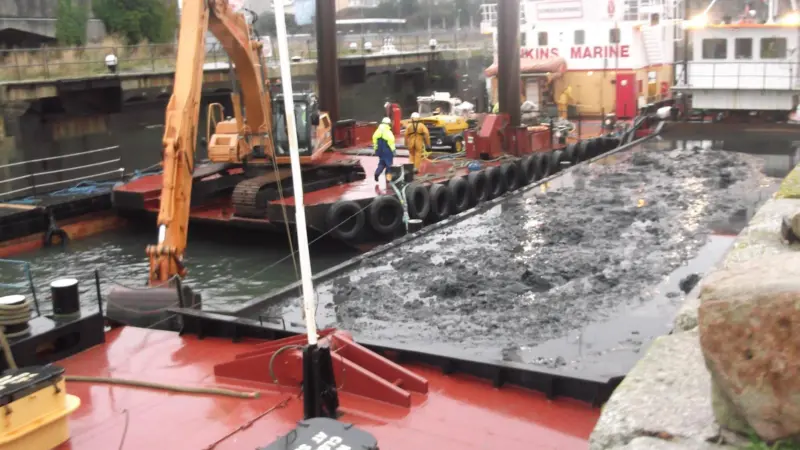 Spud barge Doreen Dorward removing contaminated waste at Millbay Dock