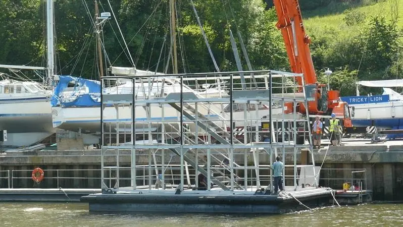 The first catamaran was tested in the water in July