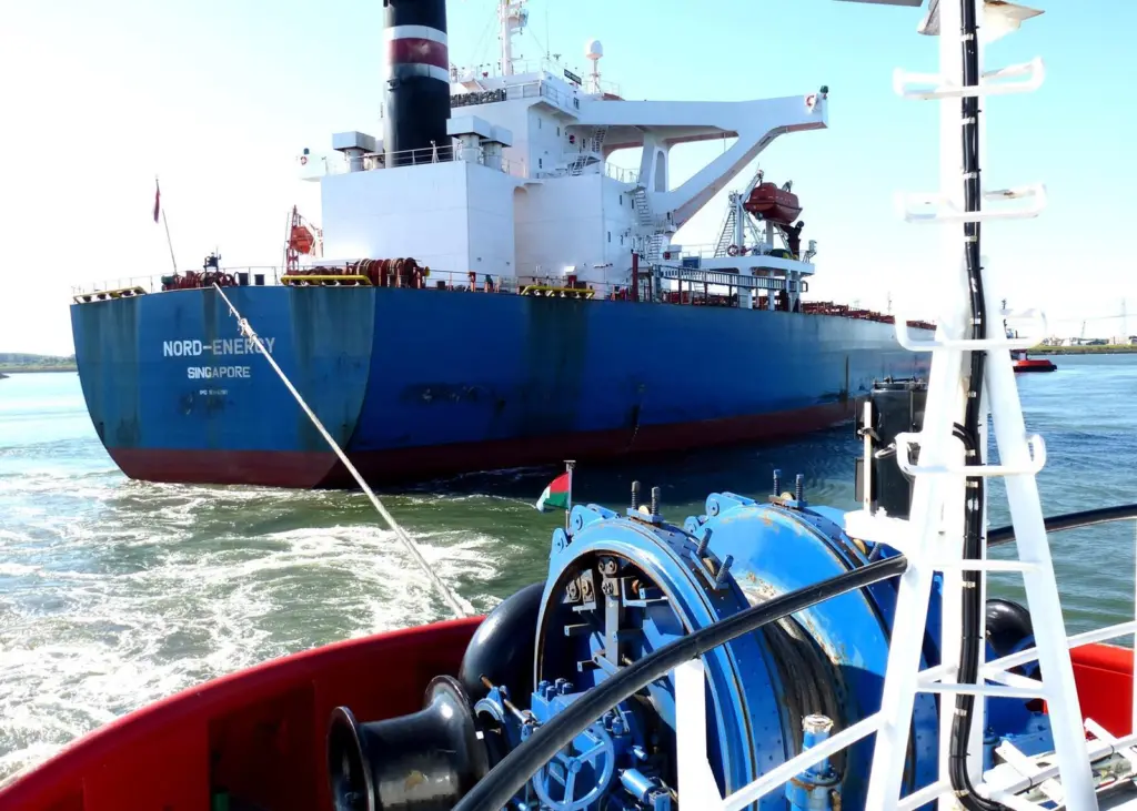RT Adriaan is seen assisting the bulk carrier Nord-Energy using its forward towing winch