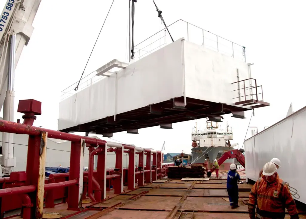 The two survivor units were transported from the workshop to the quay and lifted into position